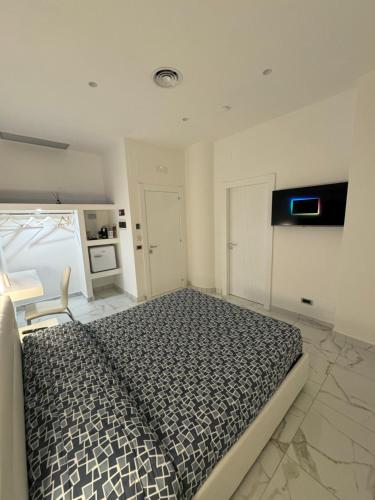 Postel nebo postele na pokoji v ubytování B&B Rossini Luxury 3