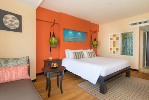 The Bayview Hotel Pattayaにあるベッド