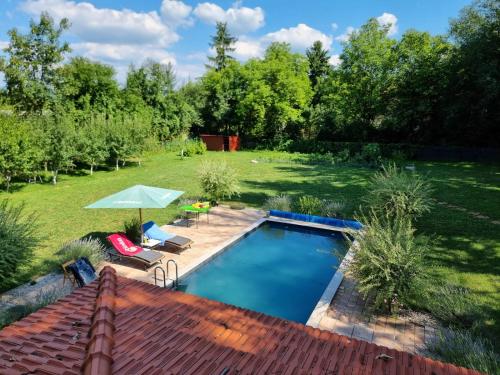 an overhead view of a backyard with a swimming pool at Apartment in Velika Aleja at Ilidža in Sarajevo