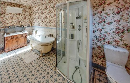 a bathroom with a shower and a sink and a toilet at 7 Bedroom Awesome Home In Charlieu in Charlieu