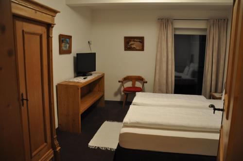 Un ou plusieurs lits dans un hébergement de l'établissement Appartement Elisabeth