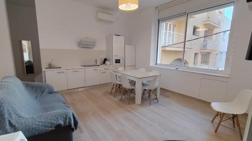 Kuchyň nebo kuchyňský kout v ubytování Rosesapparts A20deMar Triplex