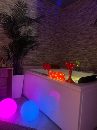 a bath tub with lights in a room at Mary Gery's Rooms in Castellammare del Golfo