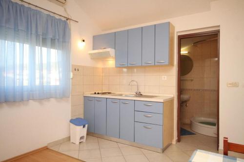 Kuchyňa alebo kuchynka v ubytovaní Apartments Sea view