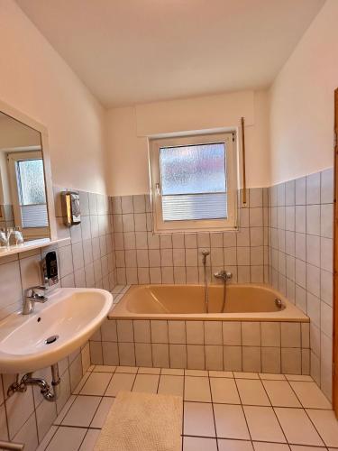 Ein Badezimmer in der Unterkunft Wiehenkrug