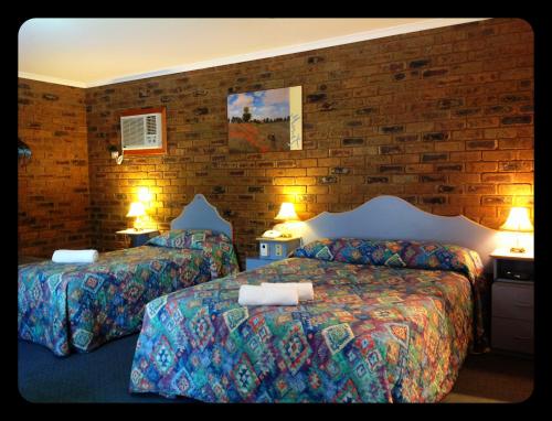 En eller flere senge i et værelse på Tooleybuc Motel