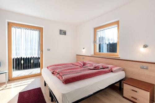 Postel nebo postele na pokoji v ubytování Innerjerberhof Sunnseit