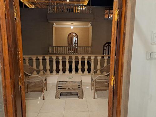 a view of a room with a table and chairs at Moon fourteen in Luxor