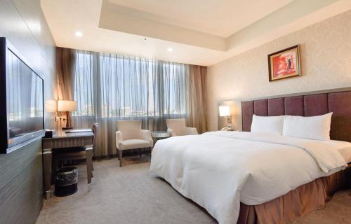 Postel nebo postele na pokoji v ubytování Arsma Hotel
