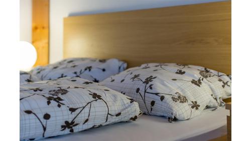 Un ou plusieurs lits dans un hébergement de l'établissement Apartmán Vrané