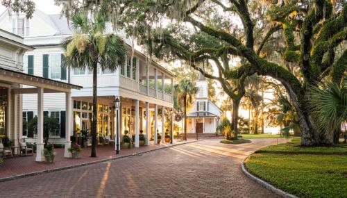 a cobblestone street in front of a white building at Lagoon View 2 Bedroom Wilson Village Home 5037 in Bluffton
