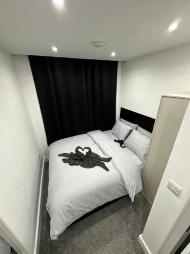 Кровать или кровати в номере St Pancras room in London