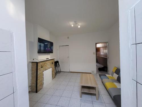 TV a/nebo společenská místnost v ubytování 2 Chambre disponible