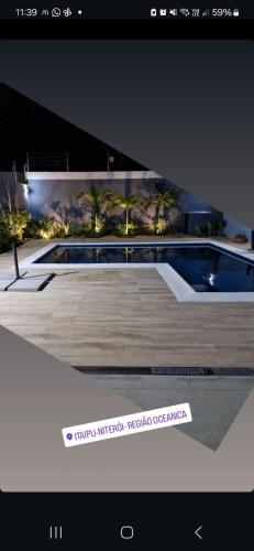 Gambar di galeri bagi Suíte em casa familiar de luxo com piscina em Itaipu di Niterói