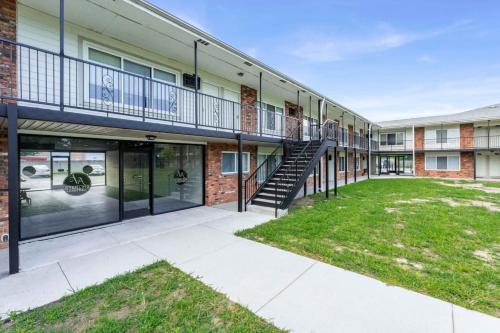 an exterior view of a building with a staircase at Central Home and Serene WiFi Pet Friendly in Sterling Heights