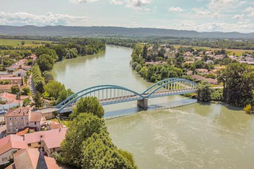 an aerial view of a bridge over a river at Le Francfort - Les appartements de l'olivier in Loyettes