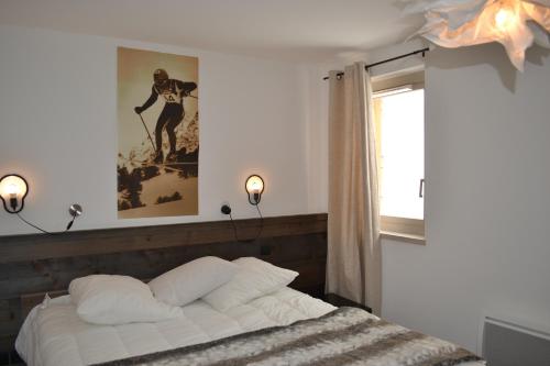 Ένα ή περισσότερα κρεβάτια σε δωμάτιο στο Chalet Le Quartz