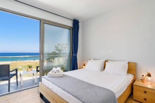 Posteľ alebo postele v izbe v ubytovaní Villa Rhodes Sea View by Villa Plus
