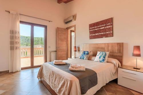 Postel nebo postele na pokoji v ubytování Villa La Boveda by Villa Plus