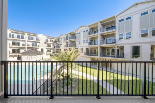 a balcony with a view of a building at Blue Bay Getaway by Pristine Properties in Highland View