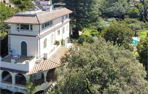 an aerial view of a large white house at 5 Bedroom Amazing Home In Grottaferrata in Grottaferrata