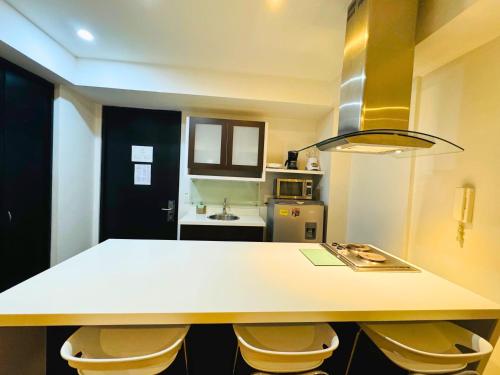 Kuchyň nebo kuchyňský kout v ubytování Aparta Suite Continental Bogotá