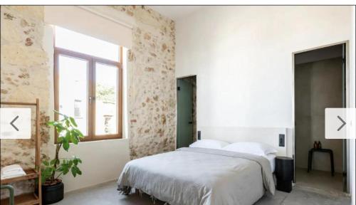 Postel nebo postele na pokoji v ubytování Holidays in Chania Hotel