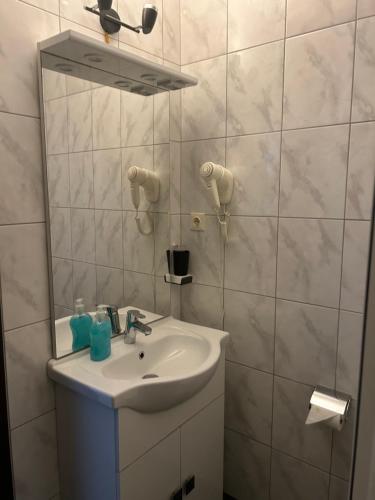 Koupelna v ubytování Hotel Berg