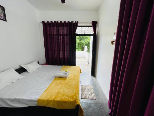 Postel nebo postele na pokoji v ubytování Shree Balaji Homestay