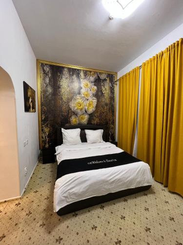 Postel nebo postele na pokoji v ubytování Hotel EvoZava Central