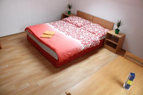 Postel nebo postele na pokoji v ubytování Penzion Semerád v Hevlíně
