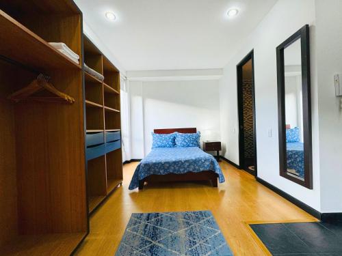 Postel nebo postele na pokoji v ubytování Aparta Suite Continental Bogotá