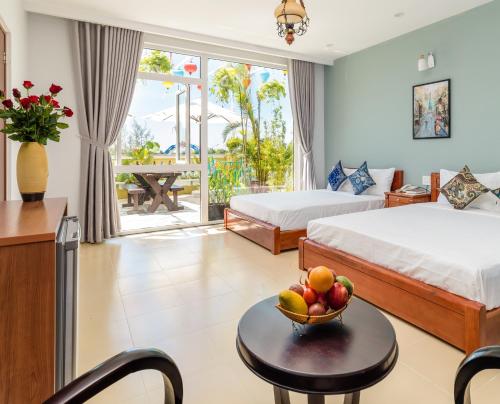 Ένα ή περισσότερα κρεβάτια σε δωμάτιο στο Private room at Hoi Ana Golden walls Homestay - Swimming pool