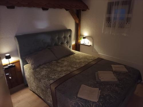 Postel nebo postele na pokoji v ubytování Vikend kuća Hana