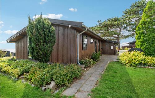 a house with a garden in front of it at Gorgeous Home In Kalundborg With Wifi in Kalundborg