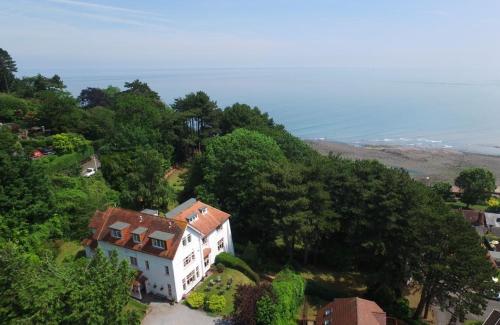 an aerial view of a house on a hill at Church Path House in Minehead