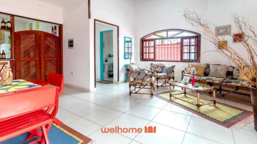 Χώρος καθιστικού στο Espaço incrível à 7 minutos a pé da praia em Itanhaém