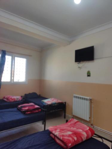 Katil atau katil-katil dalam bilik di Mirana Mayotte Hostel 47