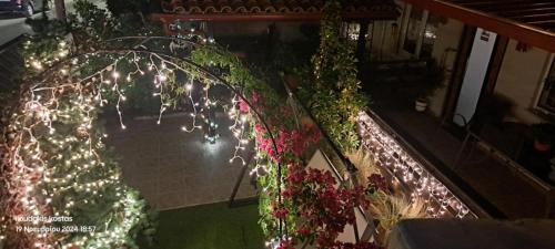 an overhead view of a building with christmas lights at Zoe garden home in Spáta