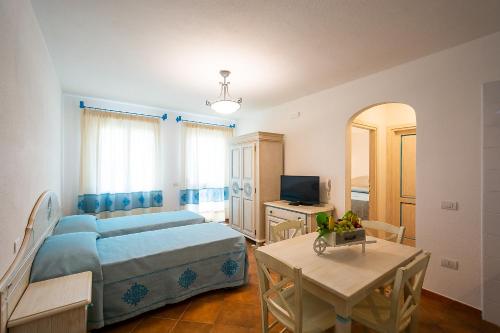 Katil atau katil-katil dalam bilik di Residence in Orosei, apartments 4 beds with air conditioning