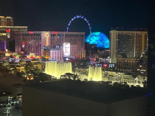 a view of the las vegas strip at night at Jet Luxury at The Vdara in Las Vegas