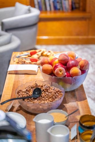 two bowls of apples and nuts on a table at The Lodge at Bow Lake in Lake Louise
