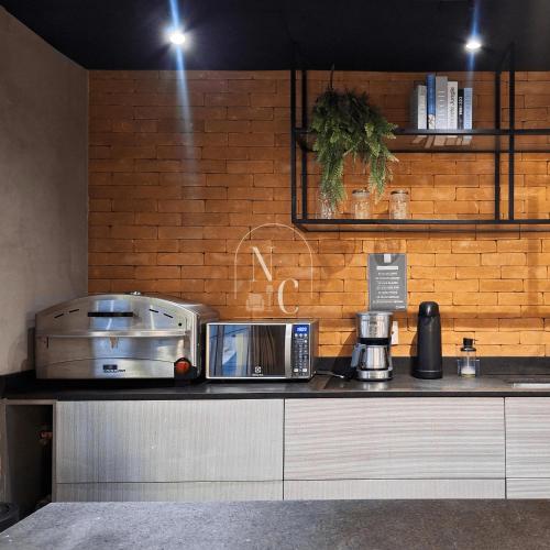 Dapur atau dapur kecil di RioDowntown Hub by RNC Flats