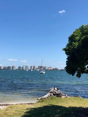 a large body of water with a city in the background at Sarasota -Walk to Siesta Key Beach in Sarasota