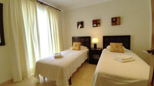 Postel nebo postele na pokoji v ubytování Villa 210 by Villamya