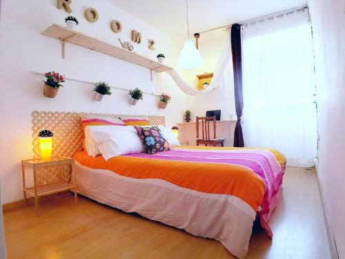 Katil atau katil-katil dalam bilik di Good Vibes Madrid