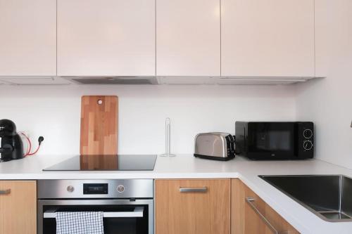 Kuchyň nebo kuchyňský kout v ubytování 1 bedroom apartment in Liège center - 3rd floor