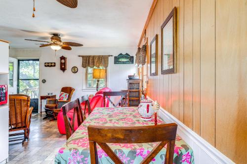a dining room with a table and chairs at Kill Devil Hills Vacation Rental, Walk to Beach! in Kill Devil Hills