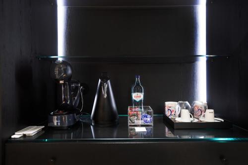 Palatial Suitesにあるコーヒーまたはお茶