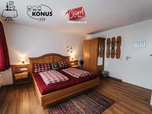 Postel nebo postele na pokoji v ubytování Forsters Schwarzwald Pension